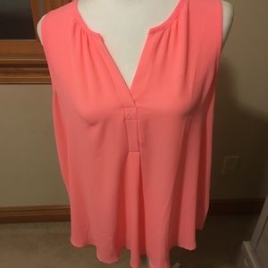 Blouse.  Color is bright peach